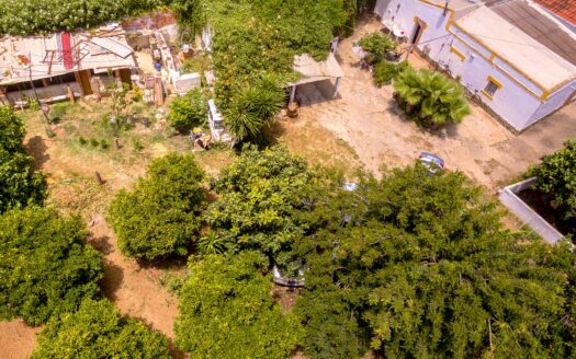 Terreno com casa