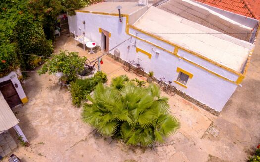 Terreno com casa