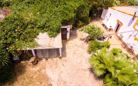 Terreno com casa